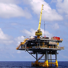 An oil rig out at sea